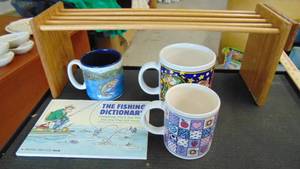 lot 10086 image: funny fishing book and coffee mug - coffee mugs