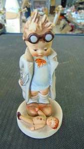 lot 10172 image: Hummel boy and doll