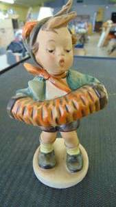 lot 10177 image: Hummel boy playing squeeze box