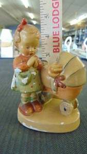 lot 10183 image: Girl and baby carriage - hummel looking