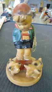 lot 10184 image: boy and pigs  - hummel looking