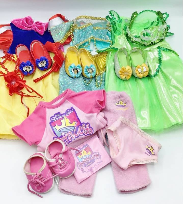 lot 1008 image: American Girl My Disney Girl Doll Costumes - Tinker Bell, Jasmine and Snow White plus My Disney Princess Jogging Outfit