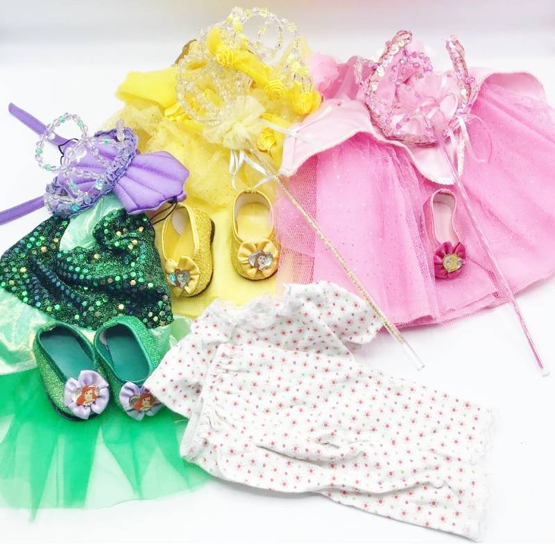 lot 1009 image: American Girl My Disney Girl Doll Costumes - Cinderella, Belle and Ariel plus a set of pajamas