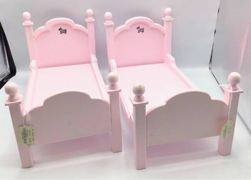 lot 1017 image: 2 wooden Pink Doll Beds
