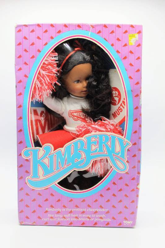 lot 1021 image: 1983 TOMY Cheerleader Kimberly Doll African American No. 2010 and Kimberly Outfit No. 2100 - NRFB