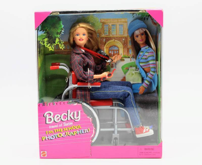 lot 1026 image: Mattel Becky friend of Barbie Im The School Photographer doll No. 20202 NRFB
