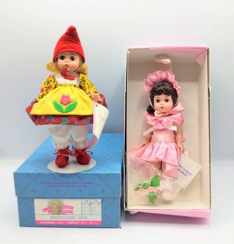 lot 1055 image: Madame Alexander Dolls Lullaby League Munchkin 13300 (in box) and Munchkin Peasant 140444 (in box) from The Wizard of Oz