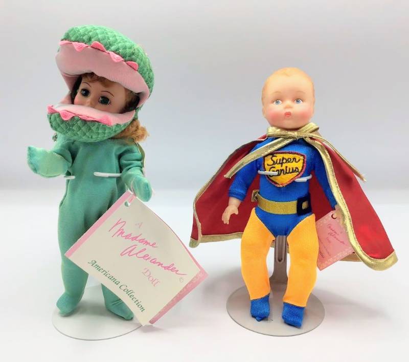 lot 1058 image: Madame Alexander Dolls Dinosaur and Little Genius