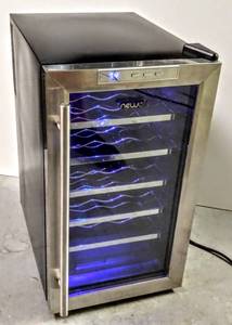 lot 101 image: NewAir 18-Bottle Stainless Steel Thermoelectric Wine Cooler  Model # AW-181E  Works Great