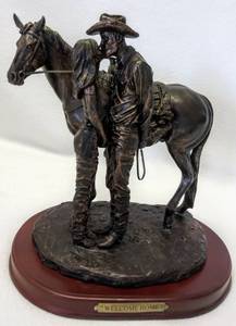 lot 109 image: Cowboy Decor  Welcome Home Statue from Western Moments  # 59012 (11 x 11 x 8.25)