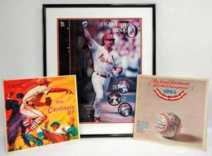 lot 128 image: Mark McGwire 70 St. Louis Cardinals Home Run King Professionally Framed Poster (1998) & 2 St. Louis Cardinals Albums (1964 & 67)