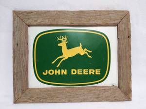 lot 129 image: 16 x 20 Metal John Deere Sign (1996) in Rustic Wood Frame