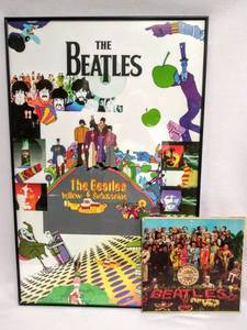 lot 135 image: The Beatles Yellow Submarine Framed Poster & The Beatles 1967 Album Sgt. Peppers Lonely Hearts Club Band wOriginal Cut-Outs Insert