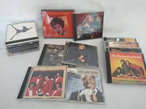 lot 5487 image: Lot of 17 Various Artists CDs  The Monkeys, SEAL, The Spinners, Whitney Houston, & More