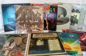 lot 5492 image: 9 Vintage Albums from Miscellaneous Artist  50 & 60s, Reggae, Bobby Caldwell, Sergio Mendes, Leo Kottke, Gary Puckett & Others
