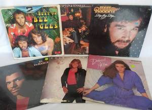 lot 5497 image: 6 Vintage Albums from Renowned Artists  Bee Gees, Captain & Tennille, Eddie Rabbitt, El DeBarge (Sealed), Leif Garrett, & Deborah Allen