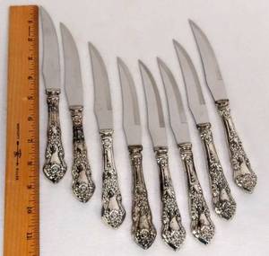 lot 5529 image: 8 Vintage Sheffield England  Rose Pattern  Stainless Steel Steak Knives