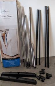 lot 5540 image: Mainstays 36 Clothes Closet - Metal & Plastic Frame (Missing Covering)