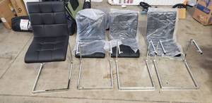 lot 4744 image: Set Of Four 35in X 25in X 15in Black Pleather And Metal Dining Room Chairs. All Hardware Appears To Be Present