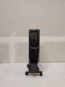 lot 4836 image: Amazon Basics, Portable Radiator Heater Black ,Tested Works 26x12x6