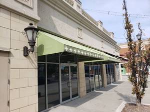 lot 6129 image: Lot (2) green awnings