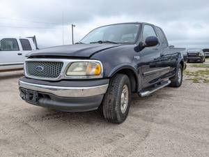 lot 7673 image: 2003 Ford F150 STX- VIN 2FTRX17233CA69939