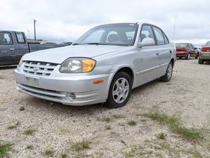 lot 7678 image: 2003 Hyundai Accent - VIN KMHCG45C03U4493268
