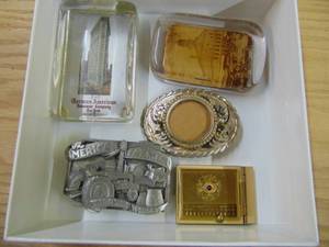lot 2971 image: Paper Weights and Belt Buckles