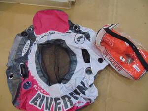 lot 3042 image: River Run Inflatable and Life Jacket
