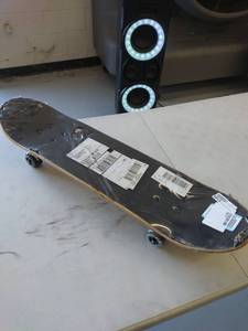 lot 5165 image: skateboard- small amount of deck damage