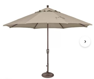 lot 5265 image: Patio Watcher 11 patio umbrella crank and steel ribs Biege