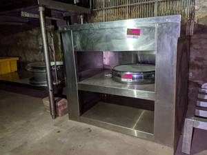 lot 5125 image: Stainless Steel Table With Shelf, Contents Not Included