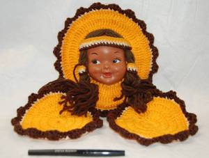 lot 2855 image: Crocheted Indian Girl, w a Indian Doll Face   w Hook to Hang on Wall