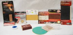 lot 2996 image: Lot of SANDING DISCS,  See Photos for Different Sizes and Grit, and a Pair of Safety Glasses