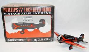 lot 4572 image: Phillips 77 Lockheed Orion Vintage Airplane Bank  wOriginal Box