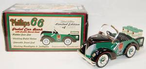 lot 4580 image: Phillips 66 Green Pedal Car Bank Motor Oils, with Locking Coin Bank w Key  (Die-Cast Metal)