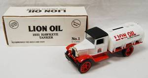 lot 4557 image: Lion Oil, 1931 Hawkeye Tanker, with Locking Coin Bank wKey, No. 1 Series (Die-Cast Metal)