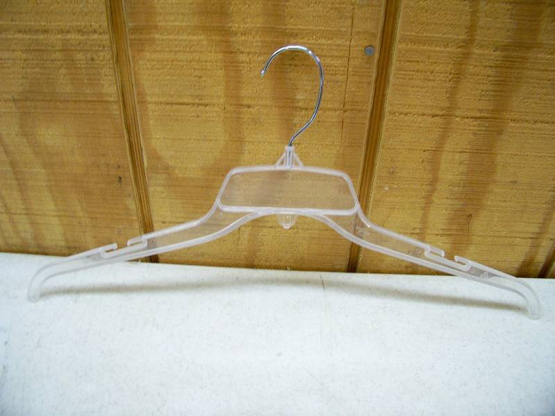 lot 1095 image: Case of 200 Clear Plastic Hangers