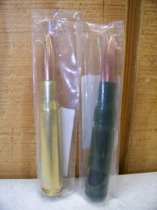 lot 1287 image: Pair of 50 Cal BMG Bottle Openers