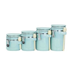 lot 4034 image: Home Basics 4-piece Ceramic Canister Set with Wooden Spoons, Turquoise