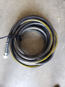 lot 4101 image: 25ft Garden Hose Out of Box