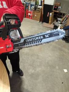 lot 14379 image: Craftsman 14 in 2 stroke hain saw