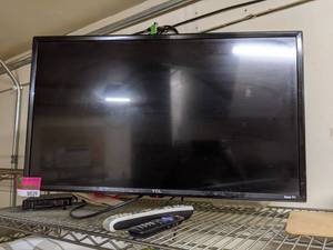 lot 8529 image: TCL Roku TV With Wall Mount, Buyer Responsible For Removal