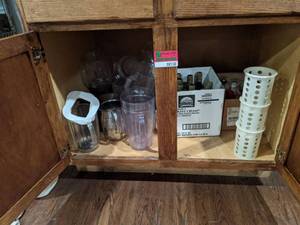 lot 8550 image: Contents Of Cabinet, Plastic Pitchers, Malt Vinegar, Salt And Pepper Shakers