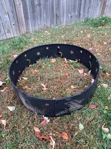 lot 103 image: Metal Fire Ring With Moon and Stars Design