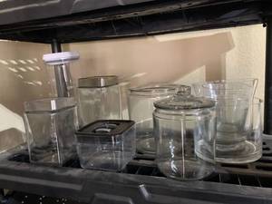 lot 4597 image: Lot of Glass and Plastic Containers Location D2