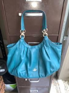 lot 4670 image: Authentic Teal Coach Handbag Location A1
