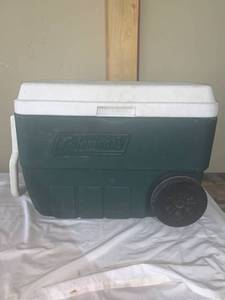 lot 4745 image: Green Rolling Coleman Cooler Location Shelf A