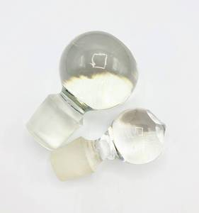 lot 5023 image: Two Crystal Bottle Decanter Stoppers