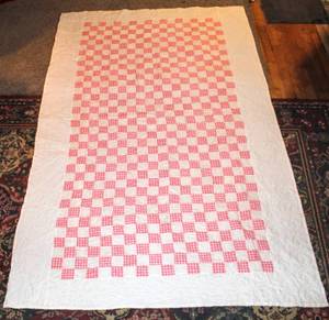 lot 5061 image: Pink and white Checkered Quilt measures 52 x 83 White Border with Pink and White Checkerboard Patchwork